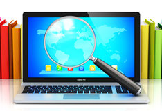 computer with magnifying glass